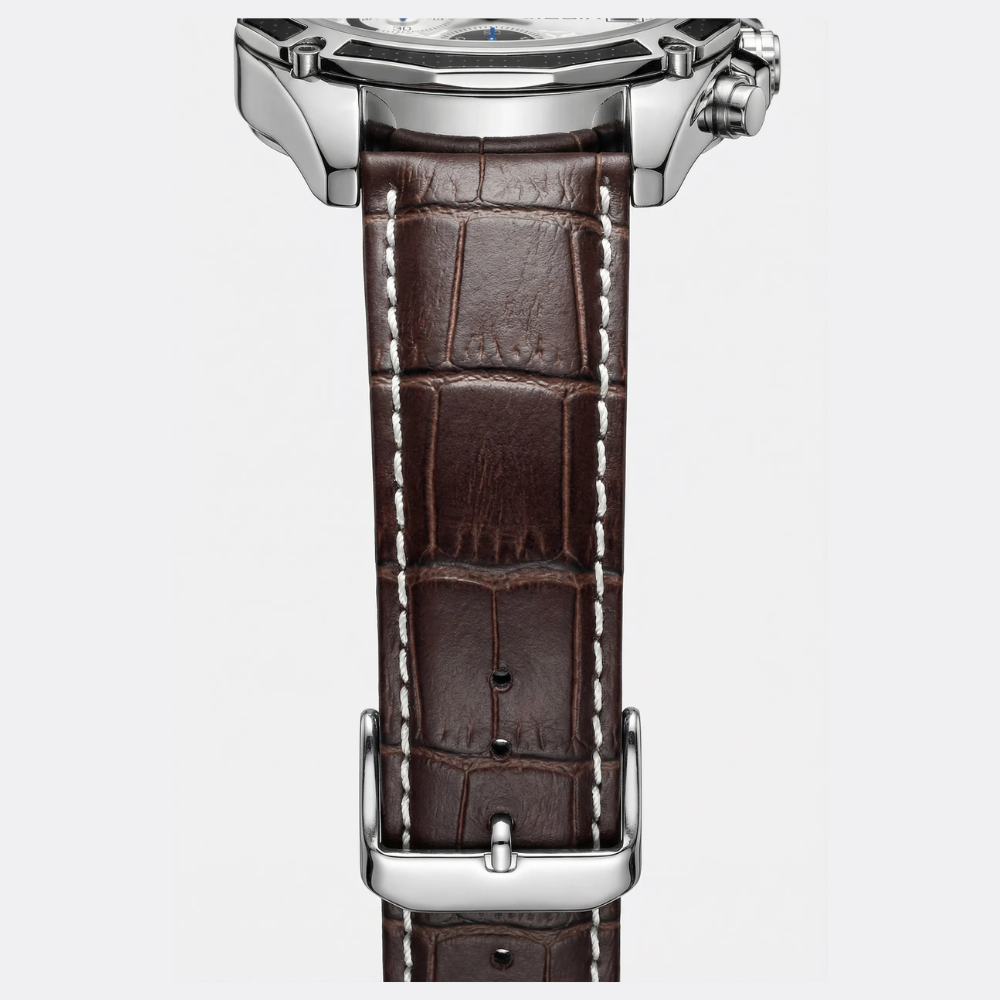 Classic straight-on view of a retro watch with a brown dial, a timeless leather strap watch.