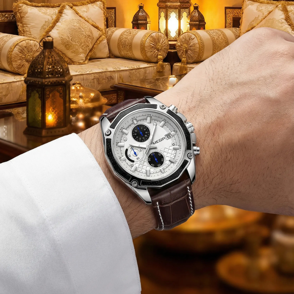 Man wearing a brown retro style watch with a leather strap on his wrist, a sophisticated business look.