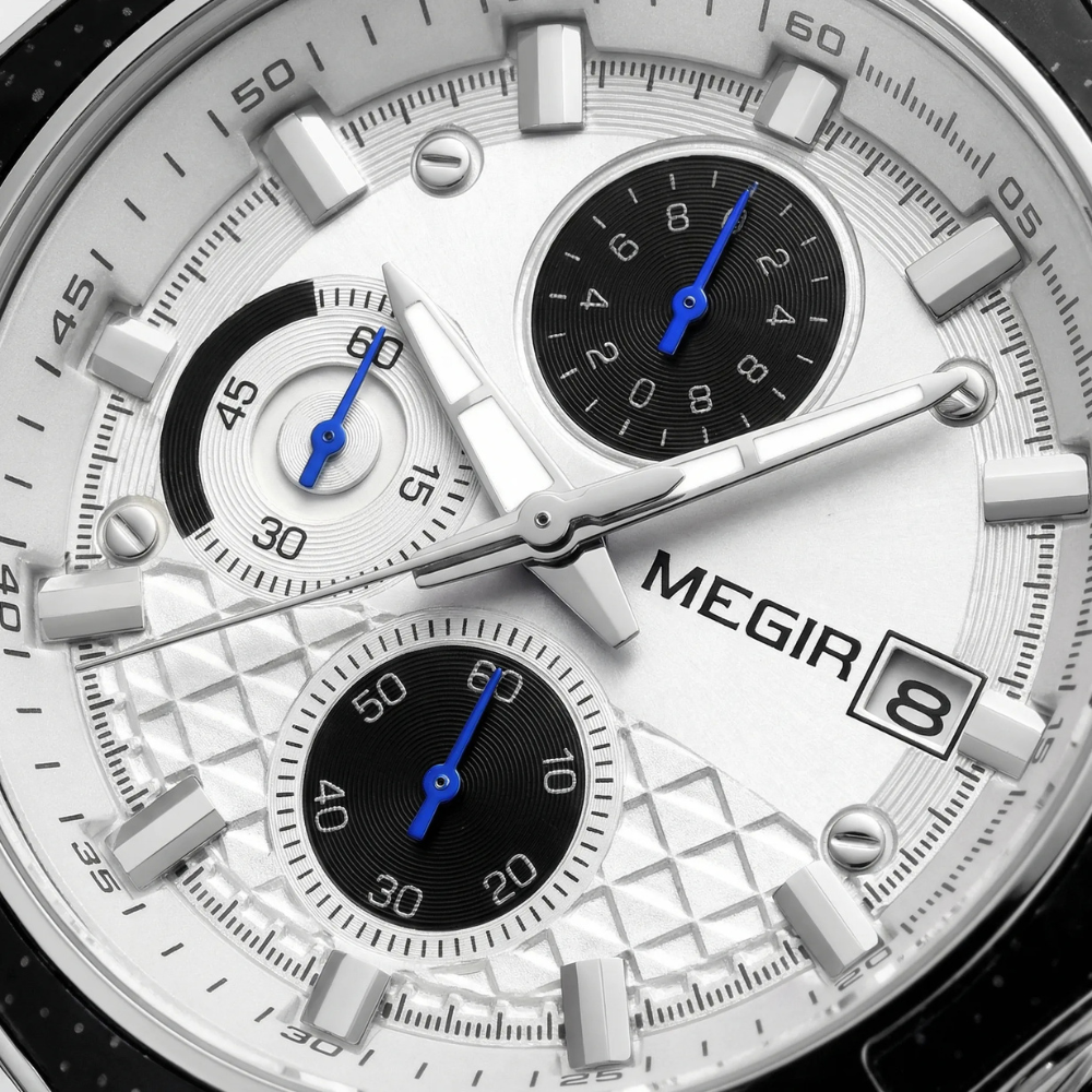 Close-up of the complex brown dial on a retro business watch, highlighting its chronograph features.