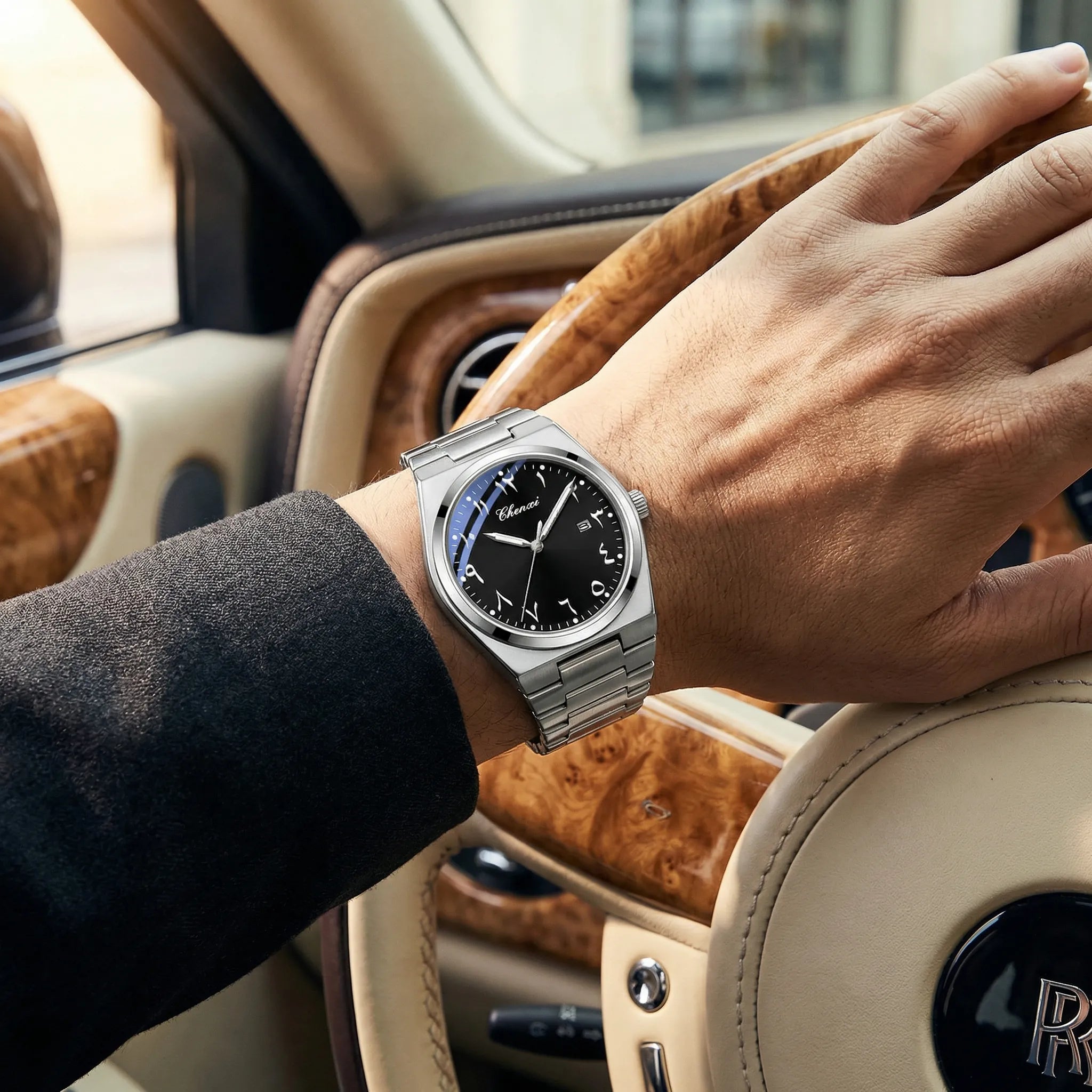 Emerson classic watch with Arabic dial, gold-tone finish, black accents