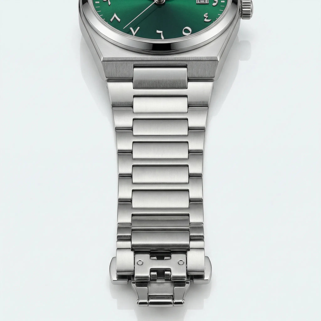 Classic straight-on view of a gold tone watch with a green Arabic dial, a timeless gold watch for men.