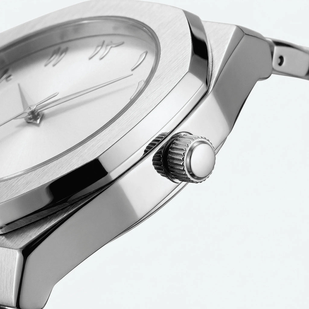 Side profile showing the slim case of a silver Arabic dial dress watch, a sleek minimalist watch.