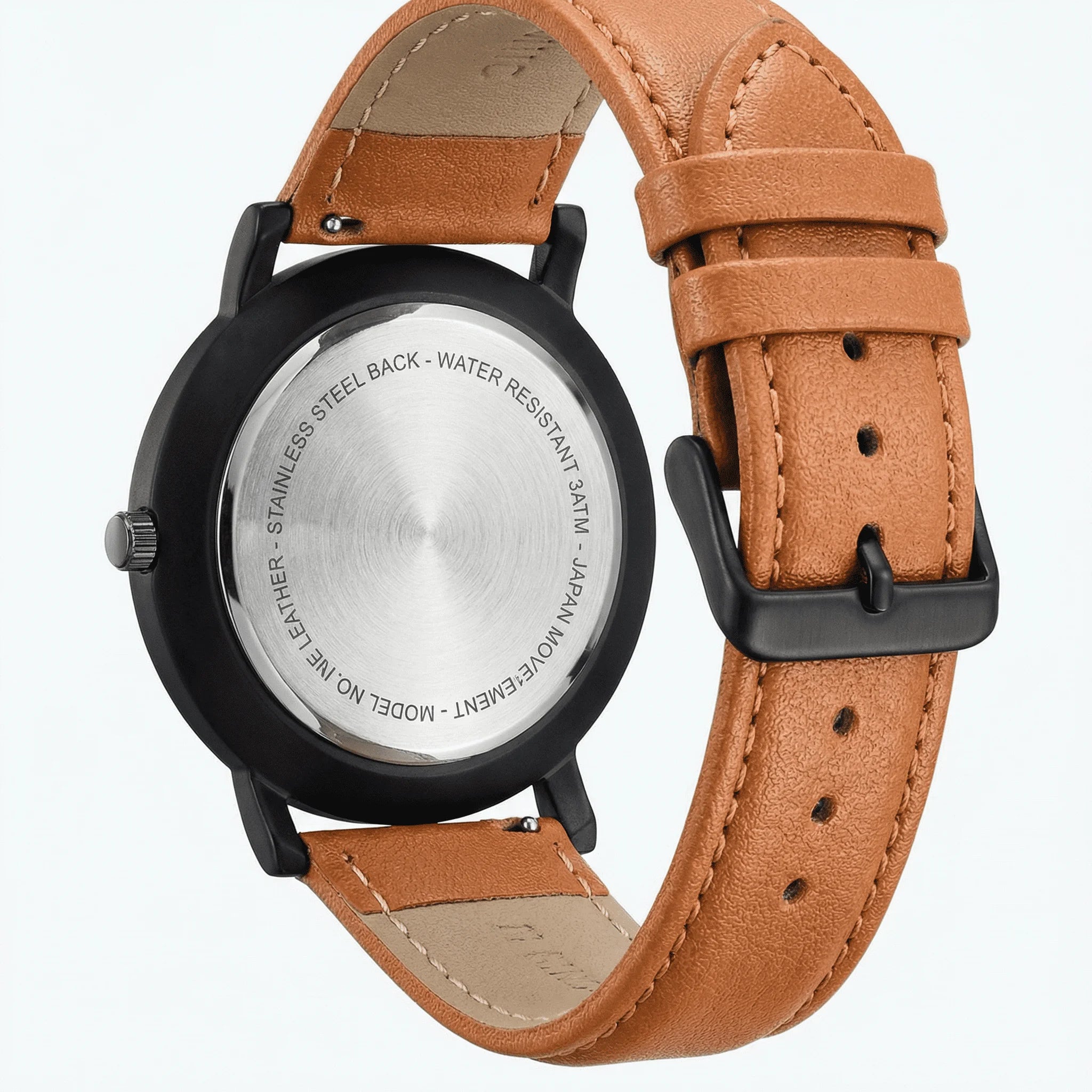 Close-up of the clean white Arabic dial on an elegant watch, highlighting its highly readable numerals.