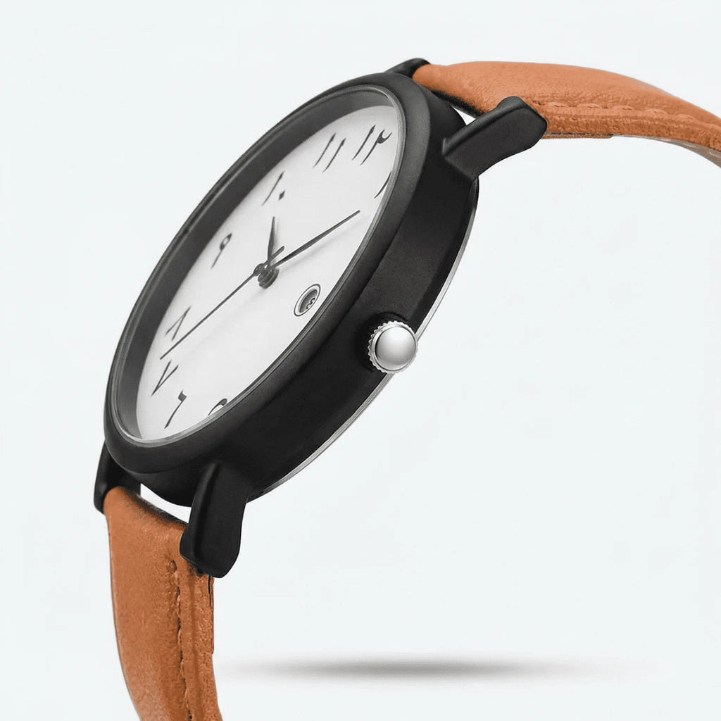 Detailed view of the supple brown leather strap on a white Arabic dial elegant watch.