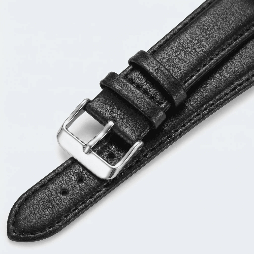Detailed view of the supple leather strap on a black Arabic dial elegant watch.
