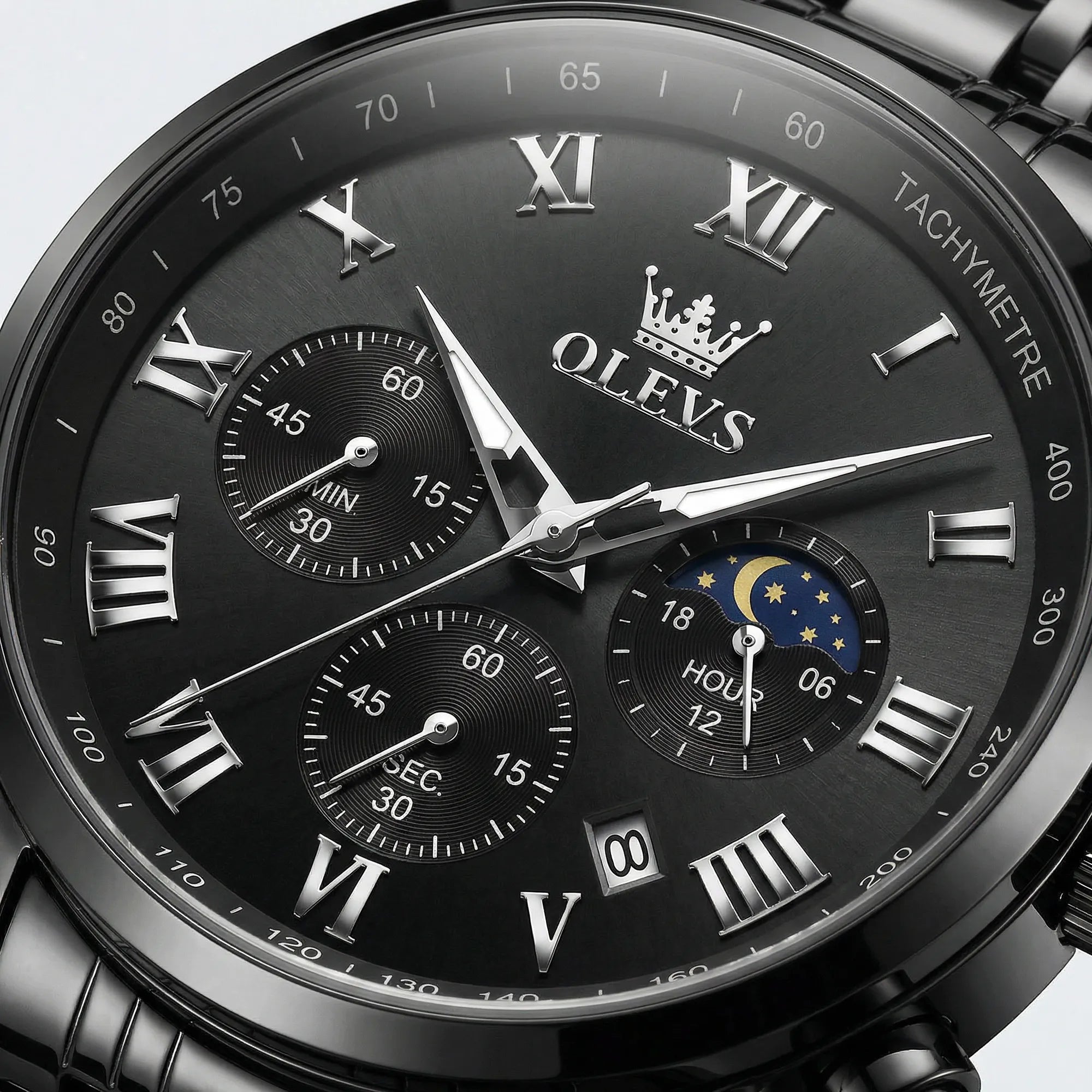 Close-up of the intricate black dial on a heavy duty stainless steel watch, a functional big dial watch.