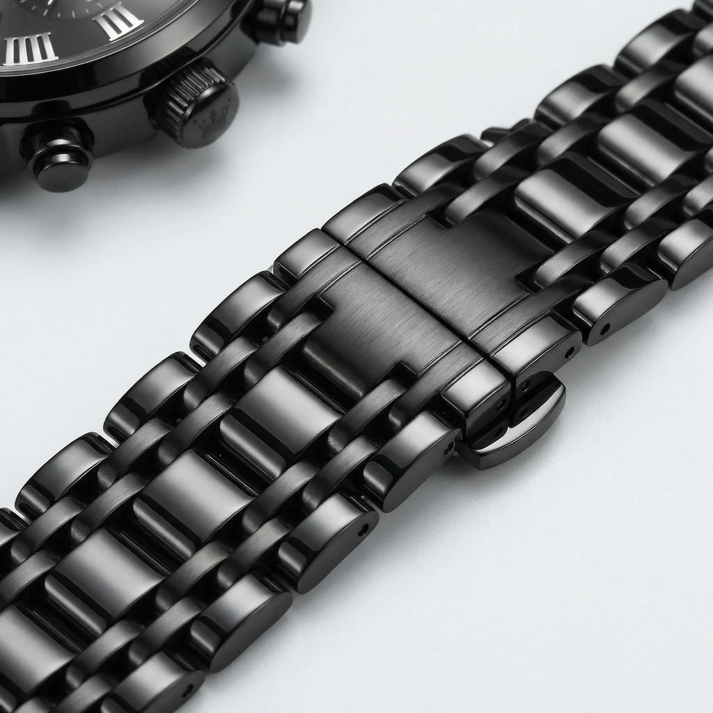 Classic straight-on view of a heavy duty black stainless steel watch, a durable everyday accessory.