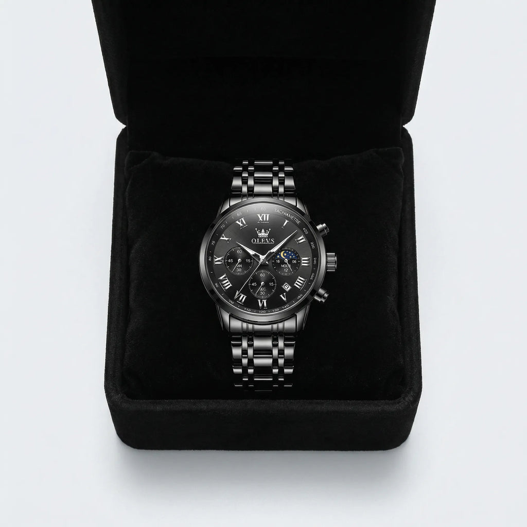 Detailed view of the thick stainless steel band and folding clasp on a heavy duty black watch.