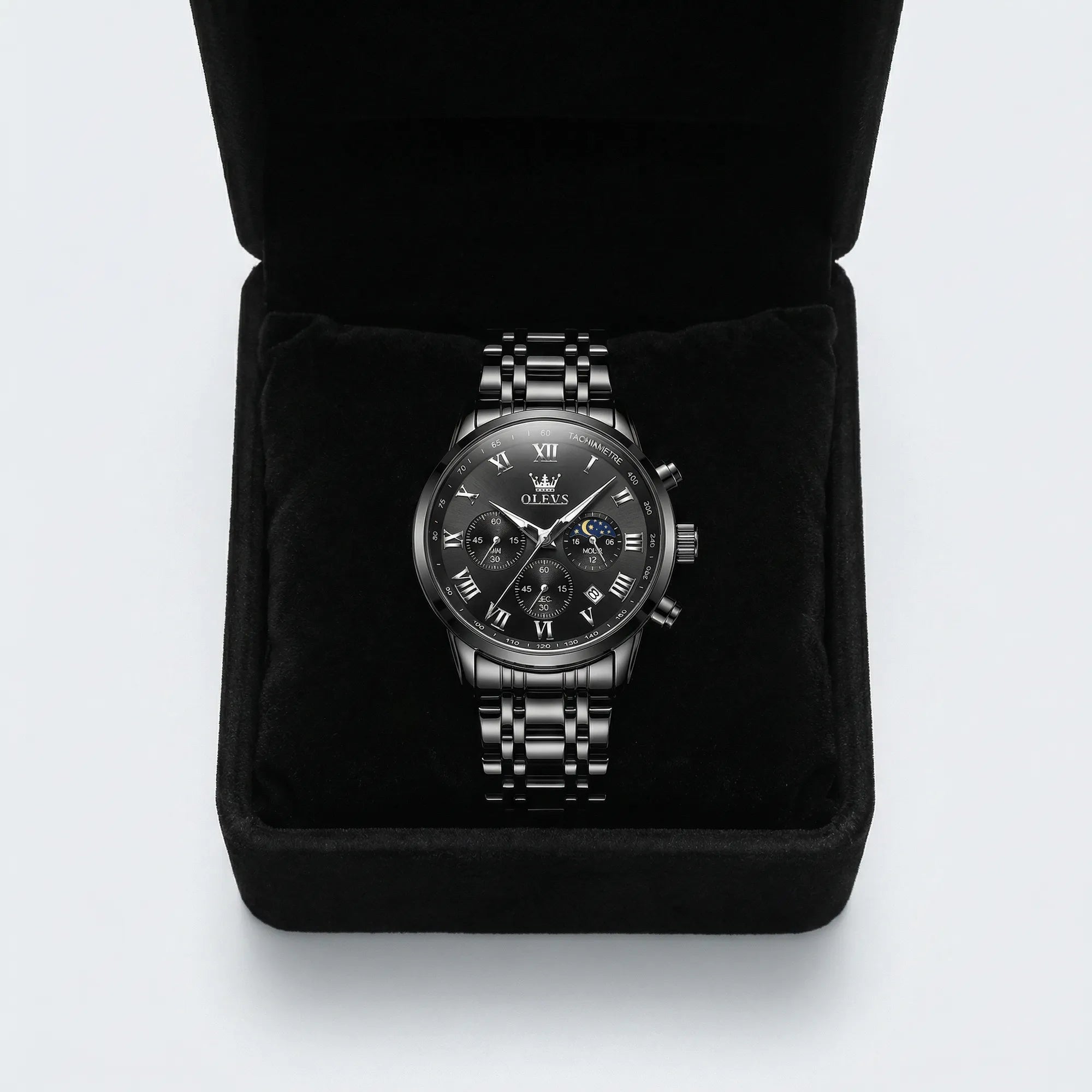 Detailed view of the thick stainless steel band and folding clasp on a heavy duty black watch.