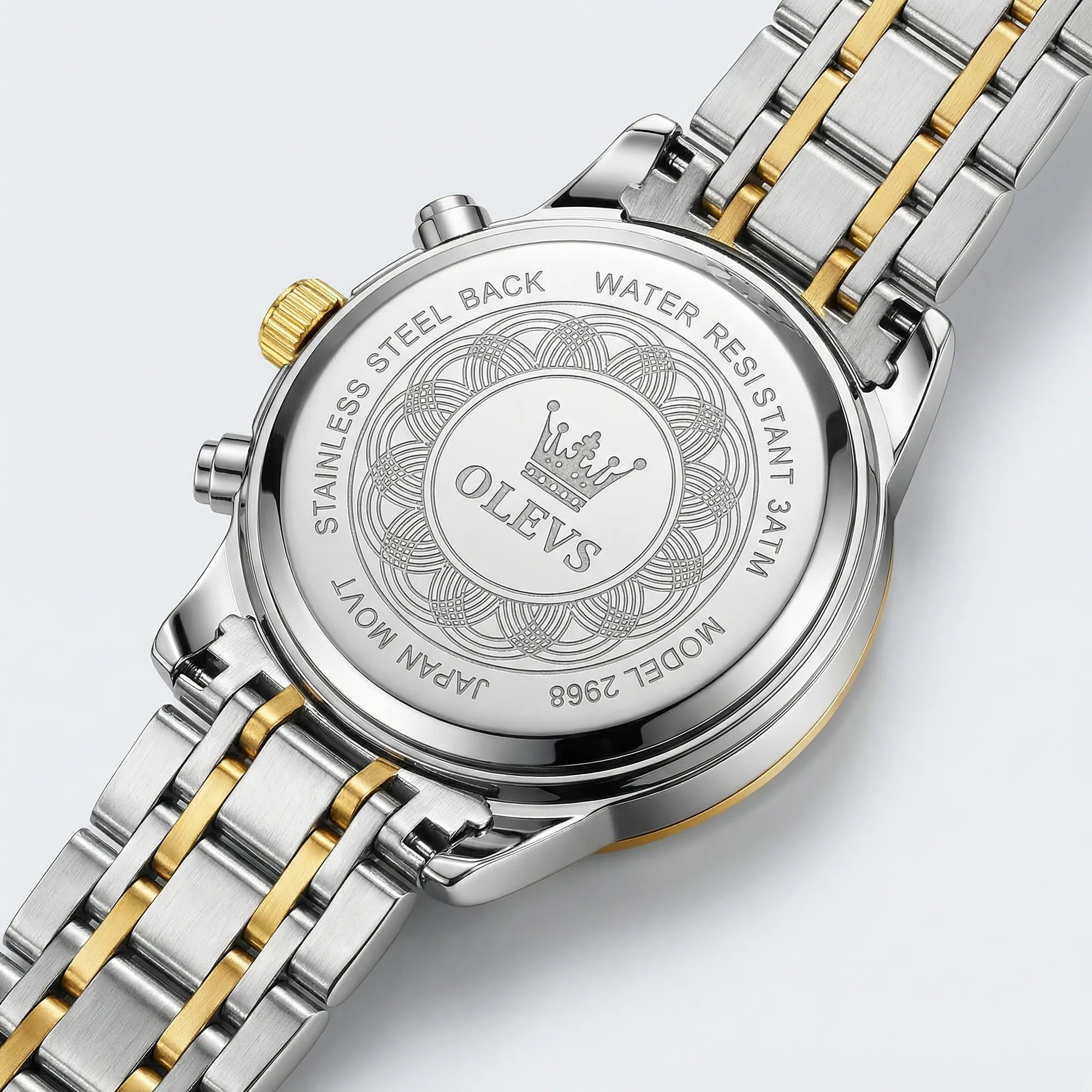 Classic straight-on view of a heavy duty gold tone watch, a durable everyday accessory.