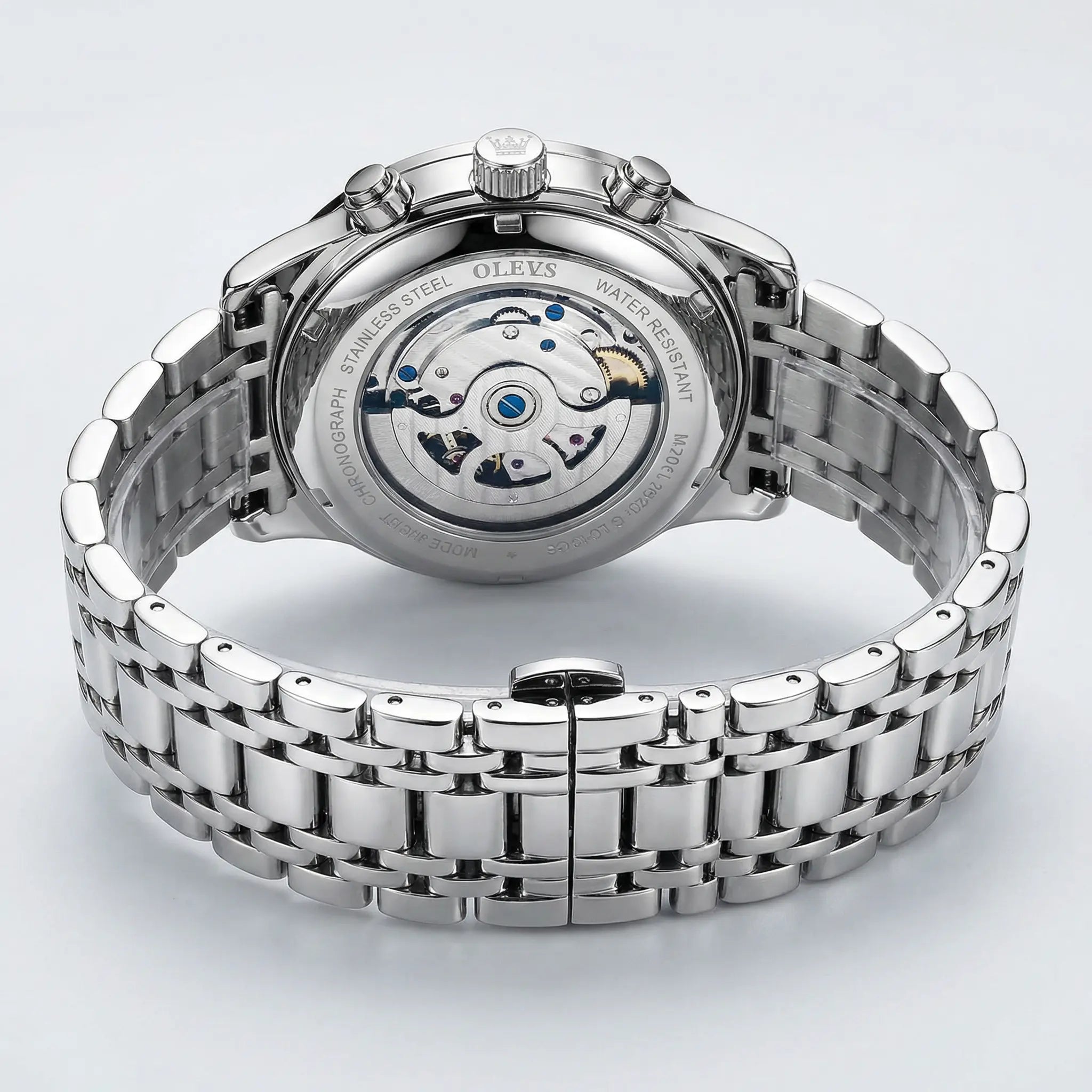 Classic straight-on view of a heavy duty silver watch, a durable everyday accessory.