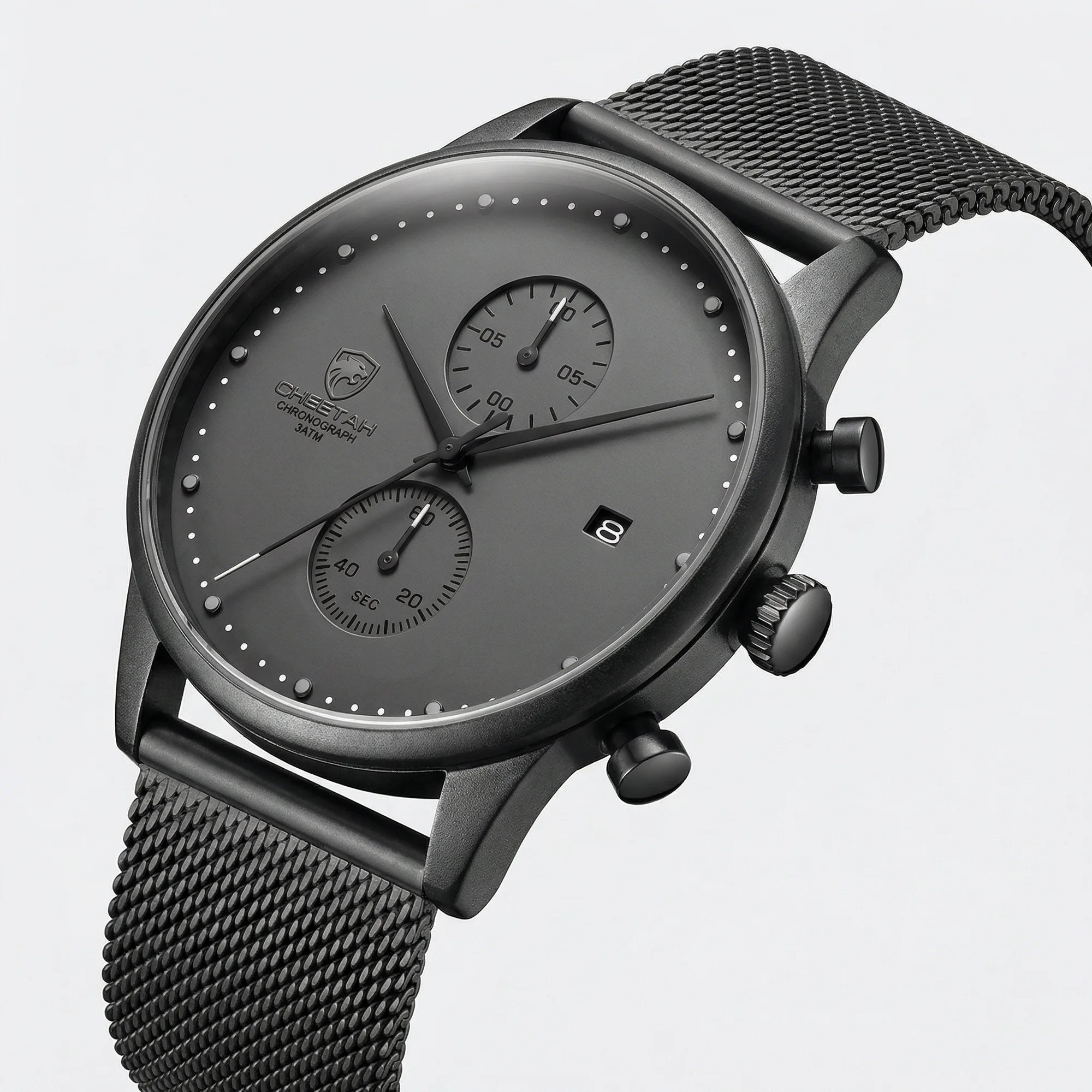 Detailed view of the flexible stainless steel mesh band on a slim gray watch.