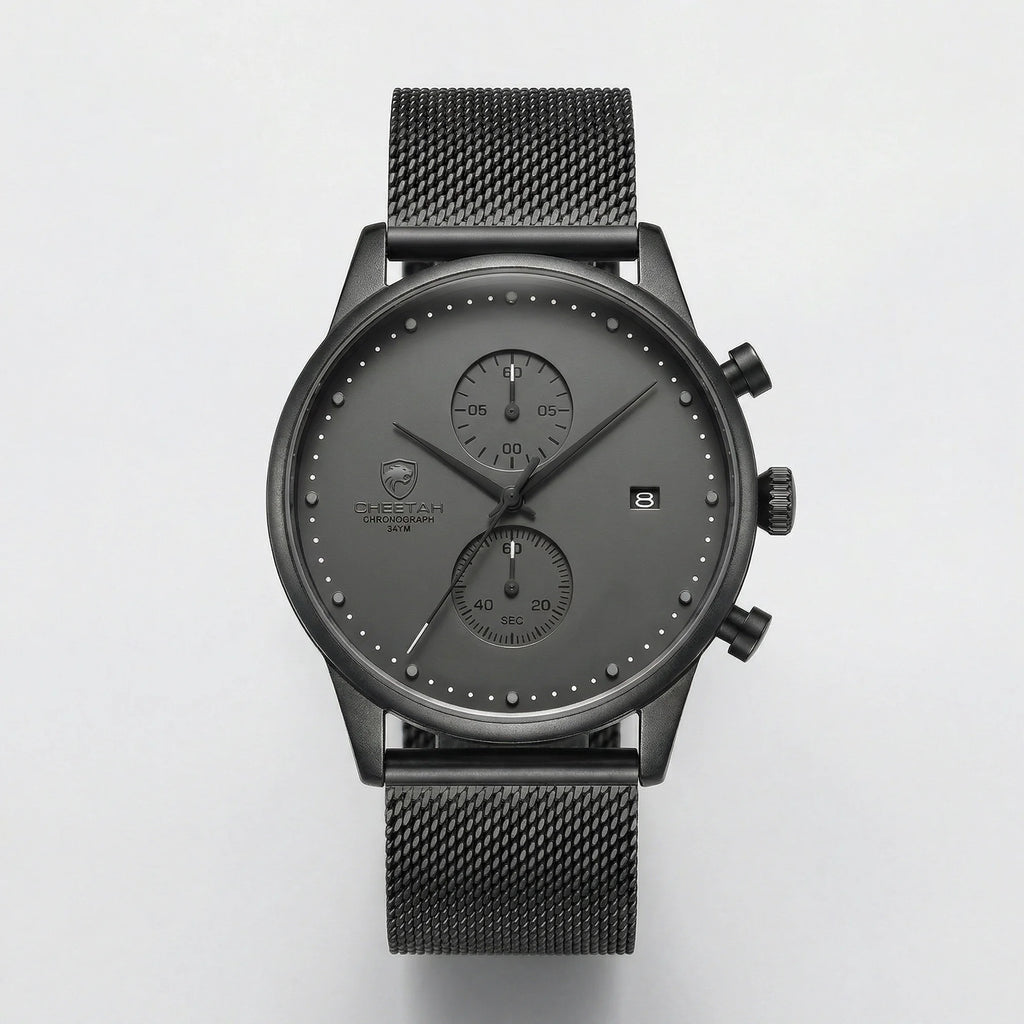 Detailed front view of a slim gray watch with a mesh band, an elegant minimalist watch for men.