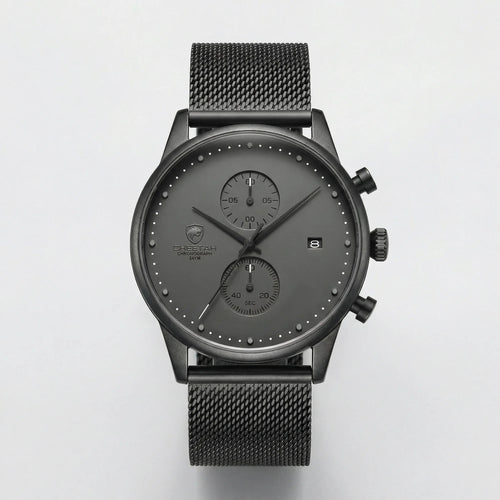 Detailed front view of a slim gray watch with a mesh band, an elegant minimalist watch for men.