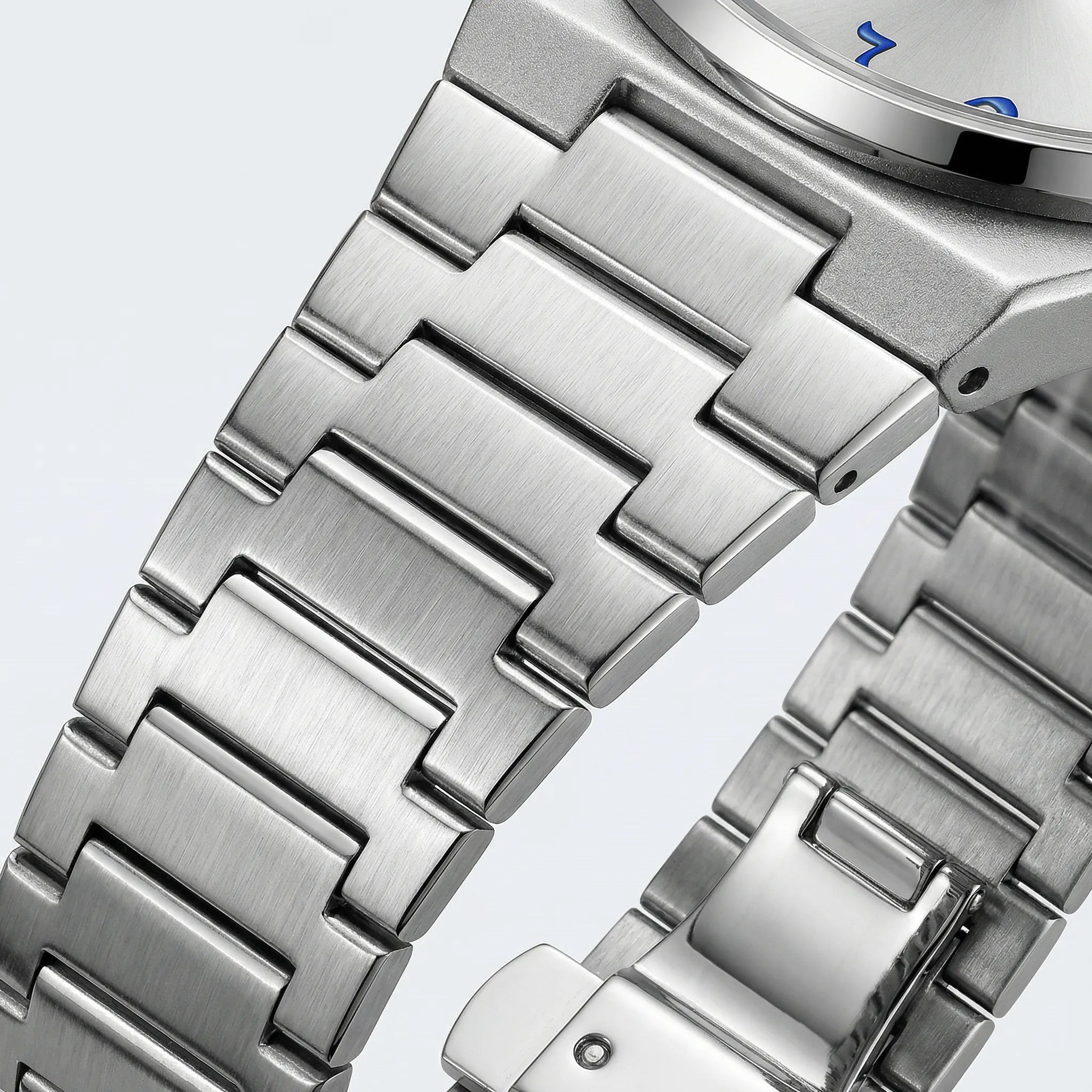 Side profile showing the durable case of a mechanical style Arabic dial watch.
