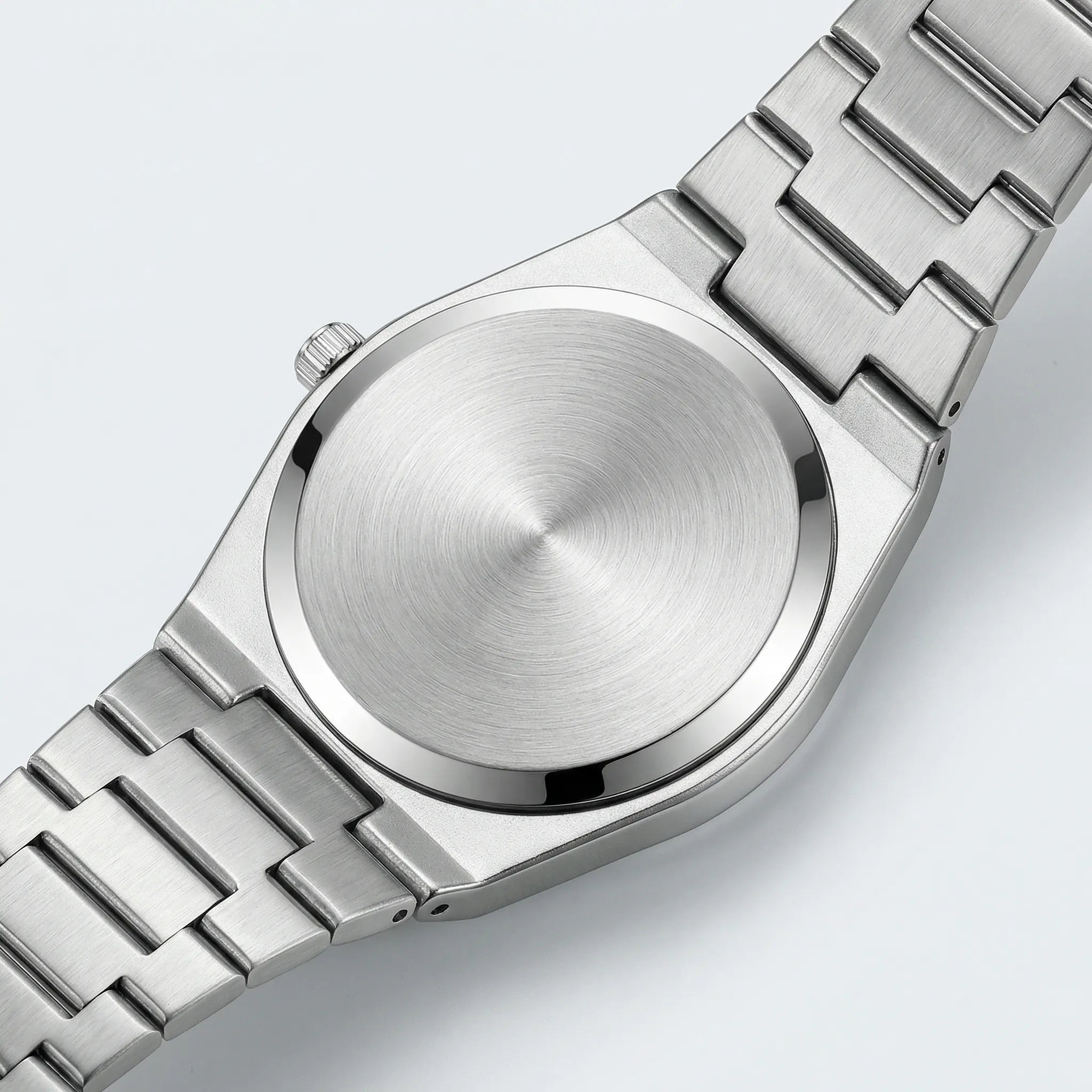 Classic straight-on view of a mechanical style watch, a striking conversation piece.