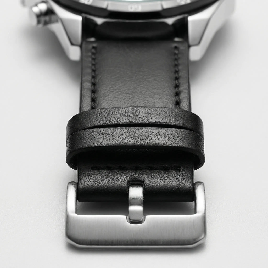 Detailed view of the black leather band on a classic everyday watch, a comfortable accessory.