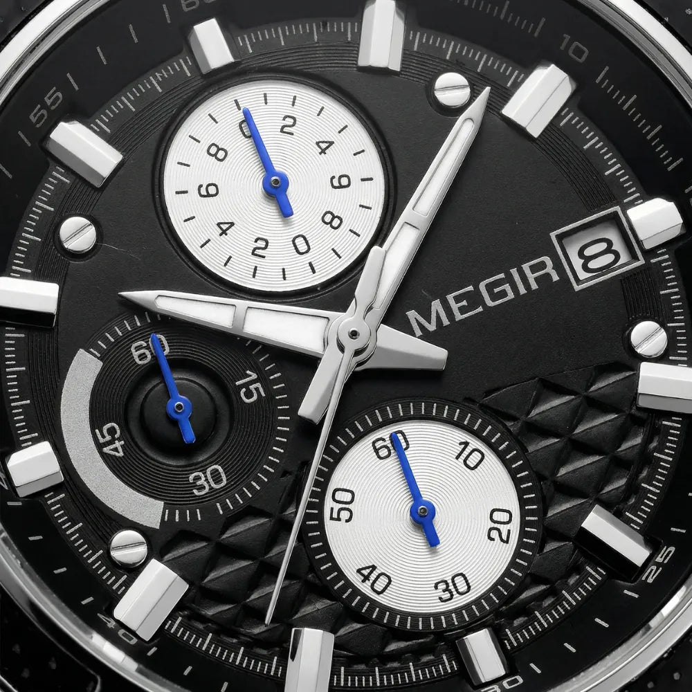 Close-up of the intricate black dial on a retro style watch, highlighting its precision movement.