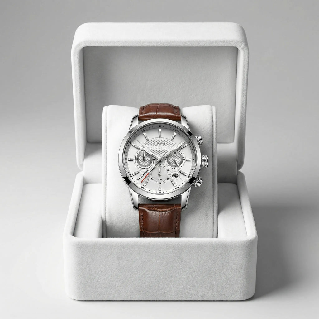 Man wearing a heritage classic watch with a white dial on his wrist, showcasing refined elegance.