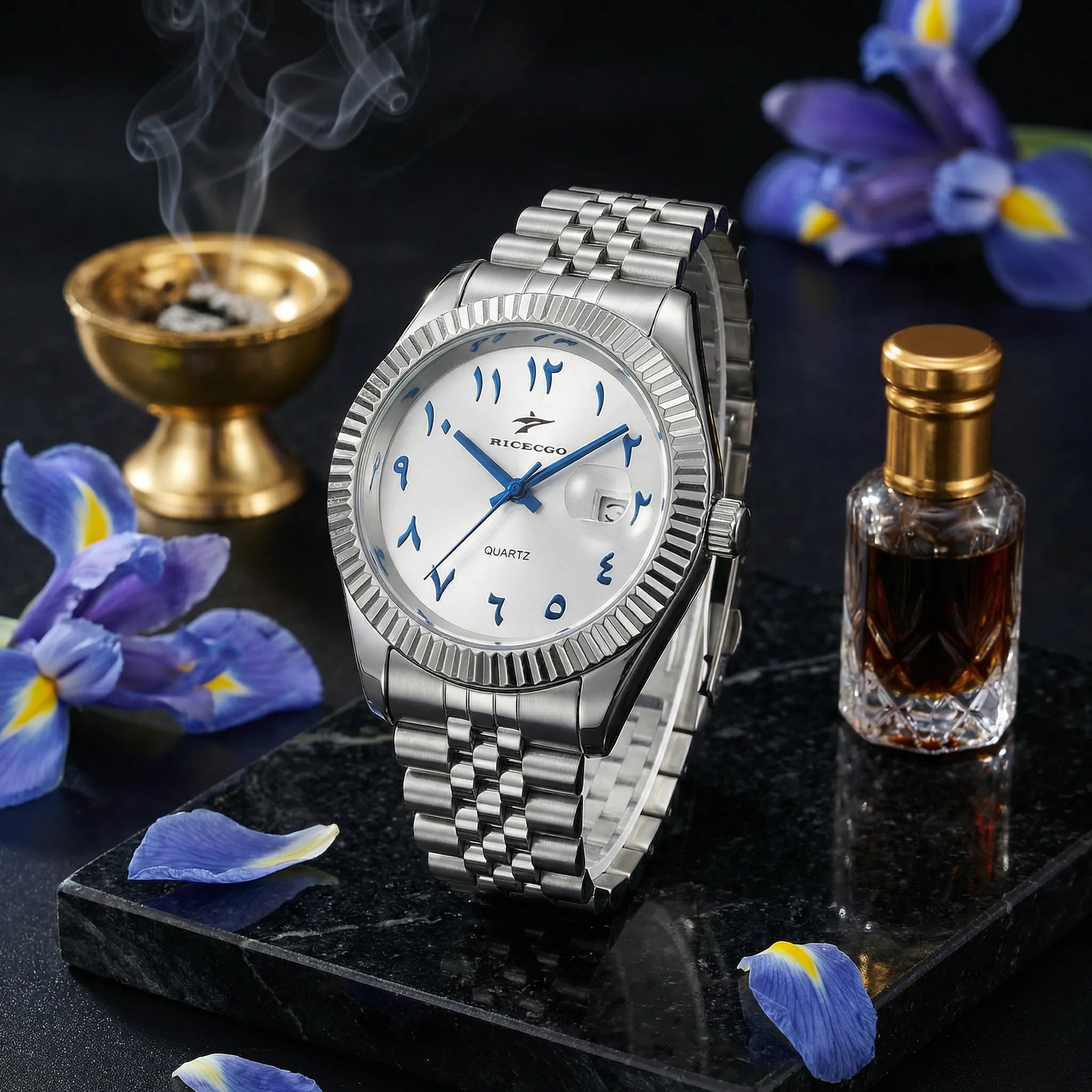 Man wearing a silver business watch with a white Arabic dial on his wrist, showcasing a professional look.