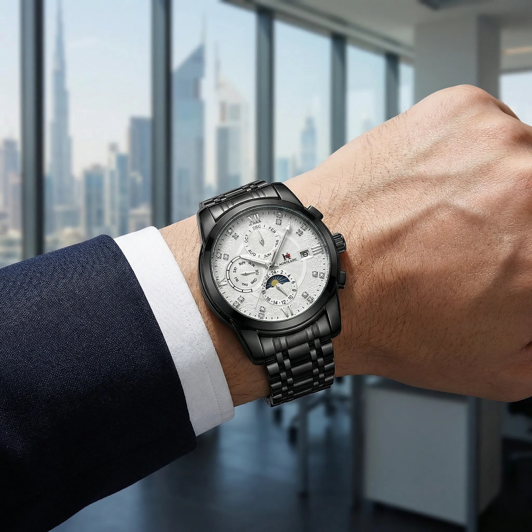 Man wearing a business watch with a black dial on his wrist, showcasing a stylish everyday accessory.