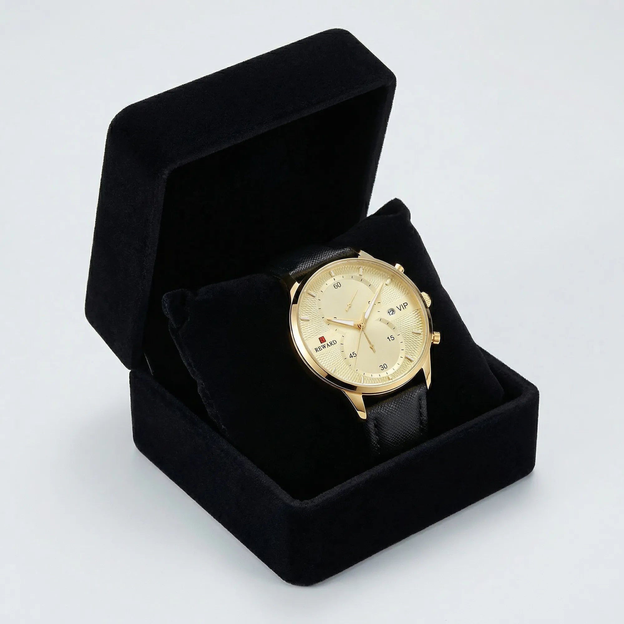 Man wearing an ultra-thin gold tone watch with a black dial on his wrist, a perfect wrist watch.