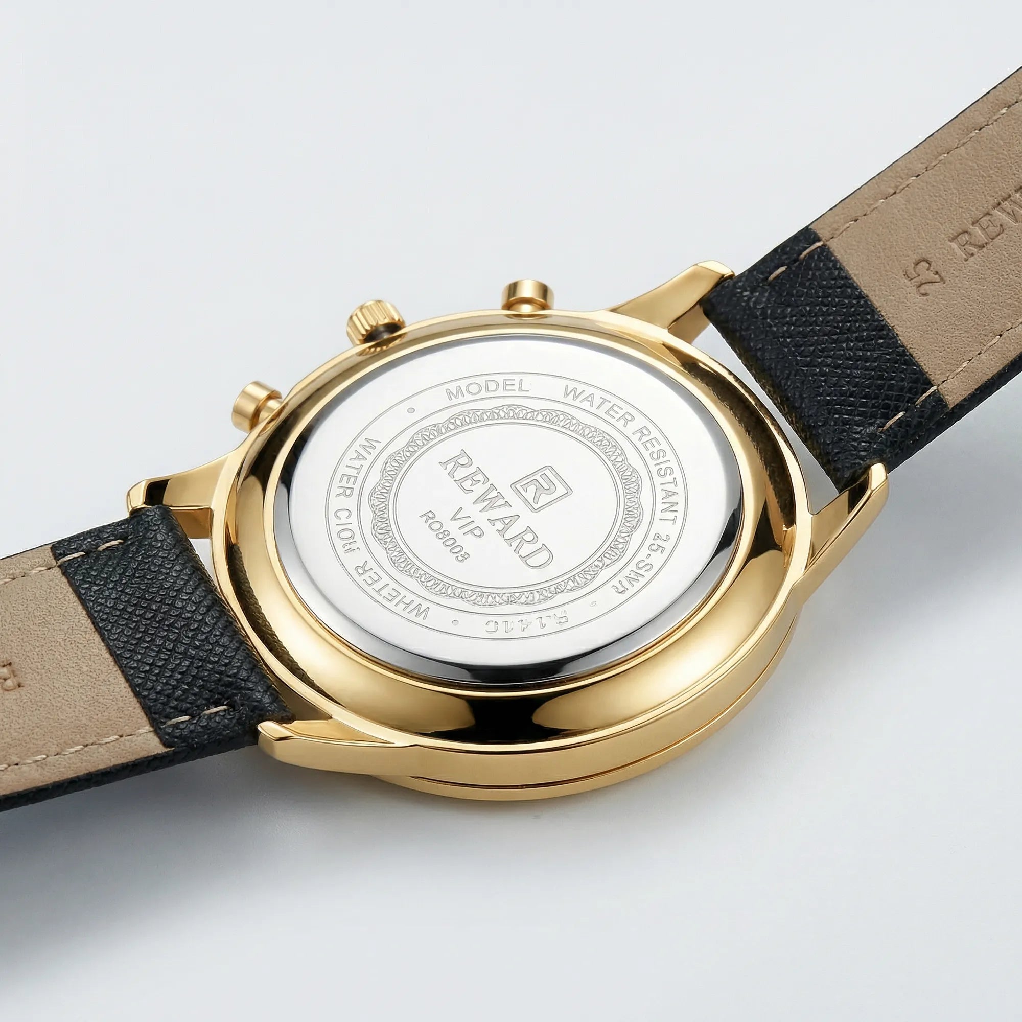 Close-up of the precision hands on a gold tone minimalist watch, a reliable quartz watch.