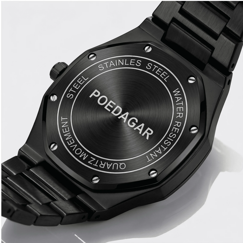 Close-up of the rich sunburst black dial and Arabic numerals on a geometric luxury watch.