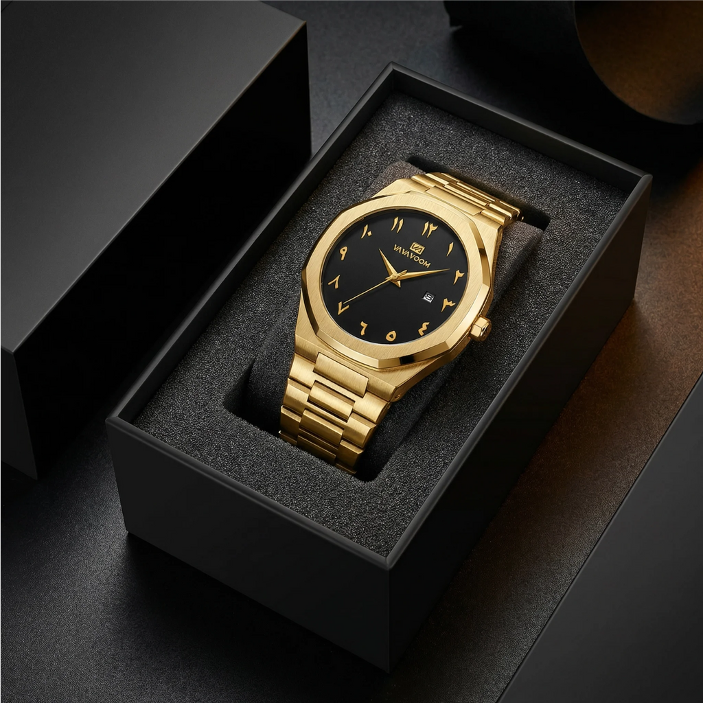 Detailed view of the integrated gold tone stainless steel band on a geometric luxury watch.