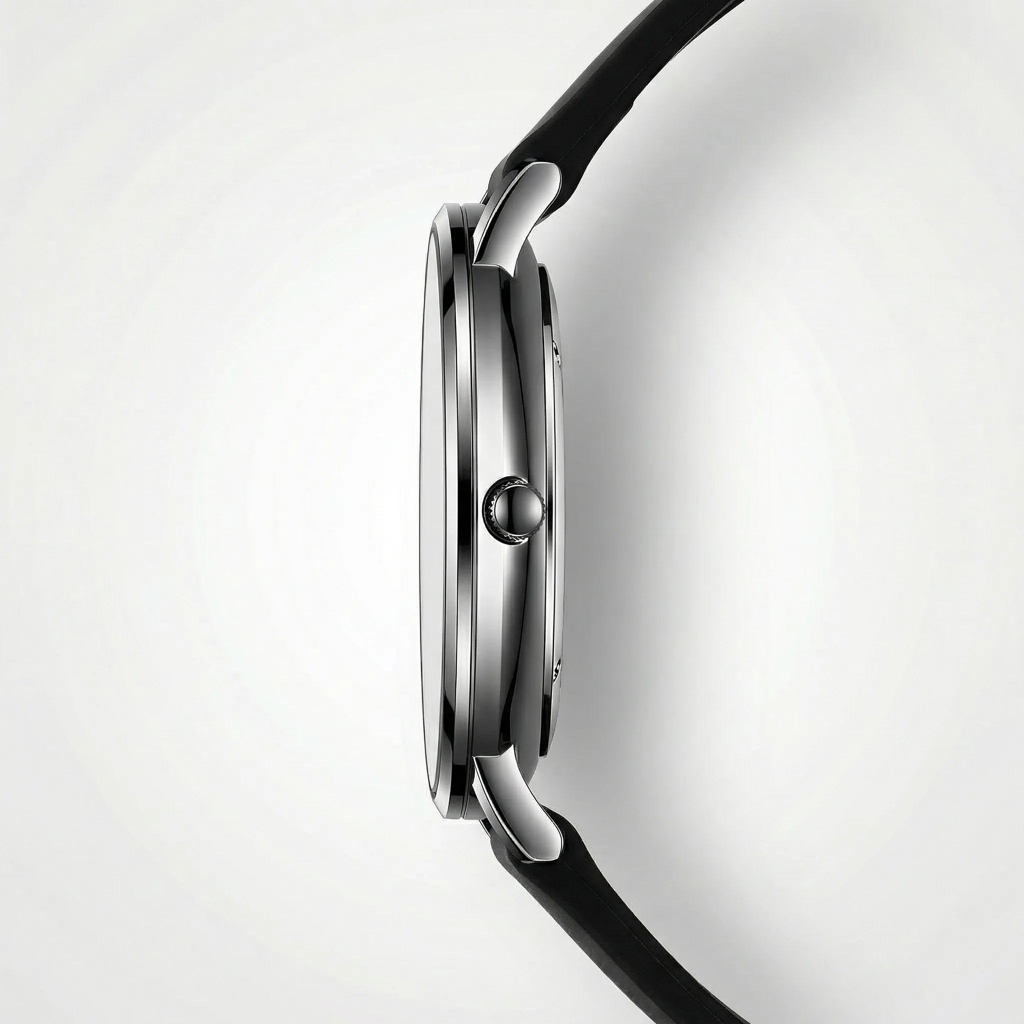 Angled presentation of a sleek black and red watch, an ultra-thin watch for men.
