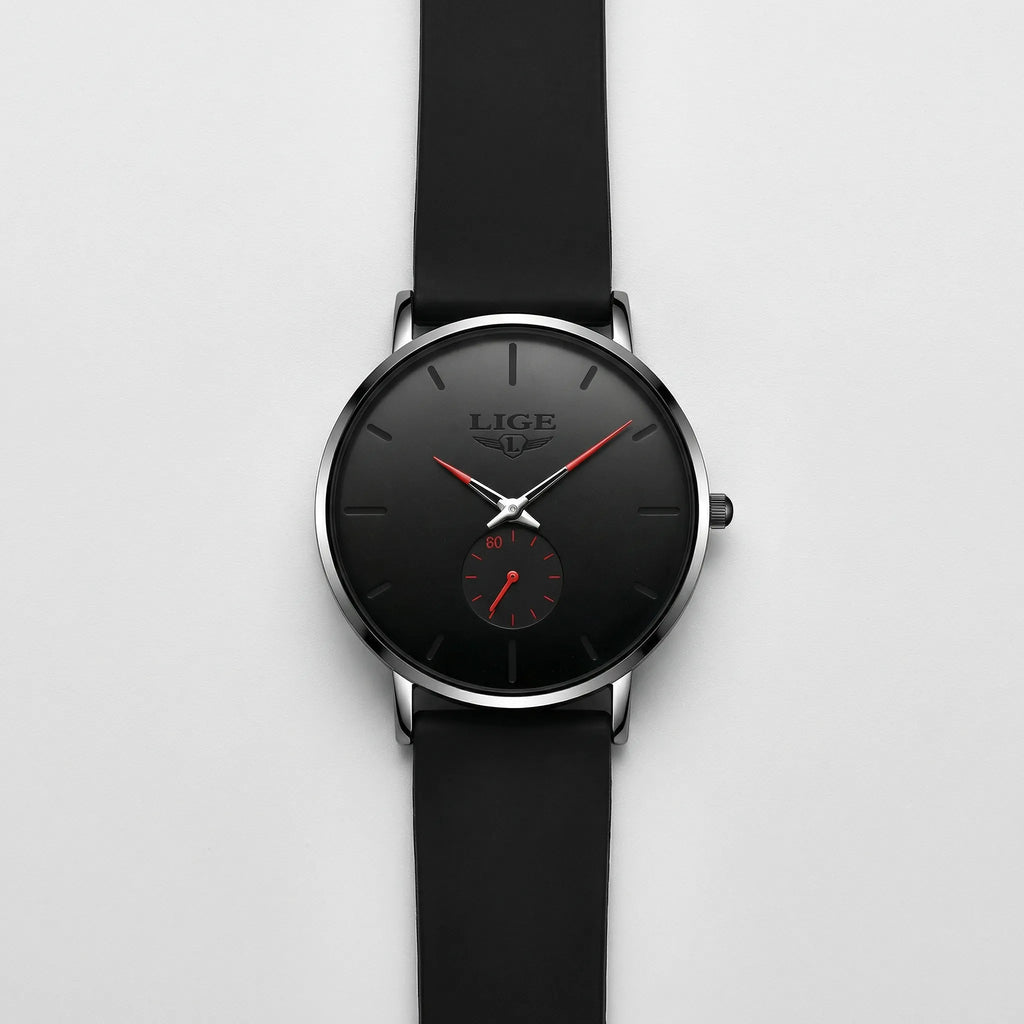 Detailed view of the flexible black mesh band on an ultra-thin minimalist watch with red accents.