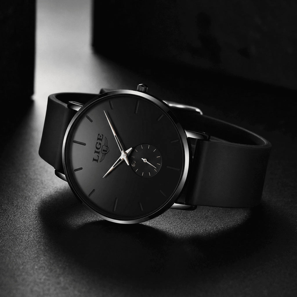 Detailed view of the flexible black mesh band on an ultra-thin minimalist watch.