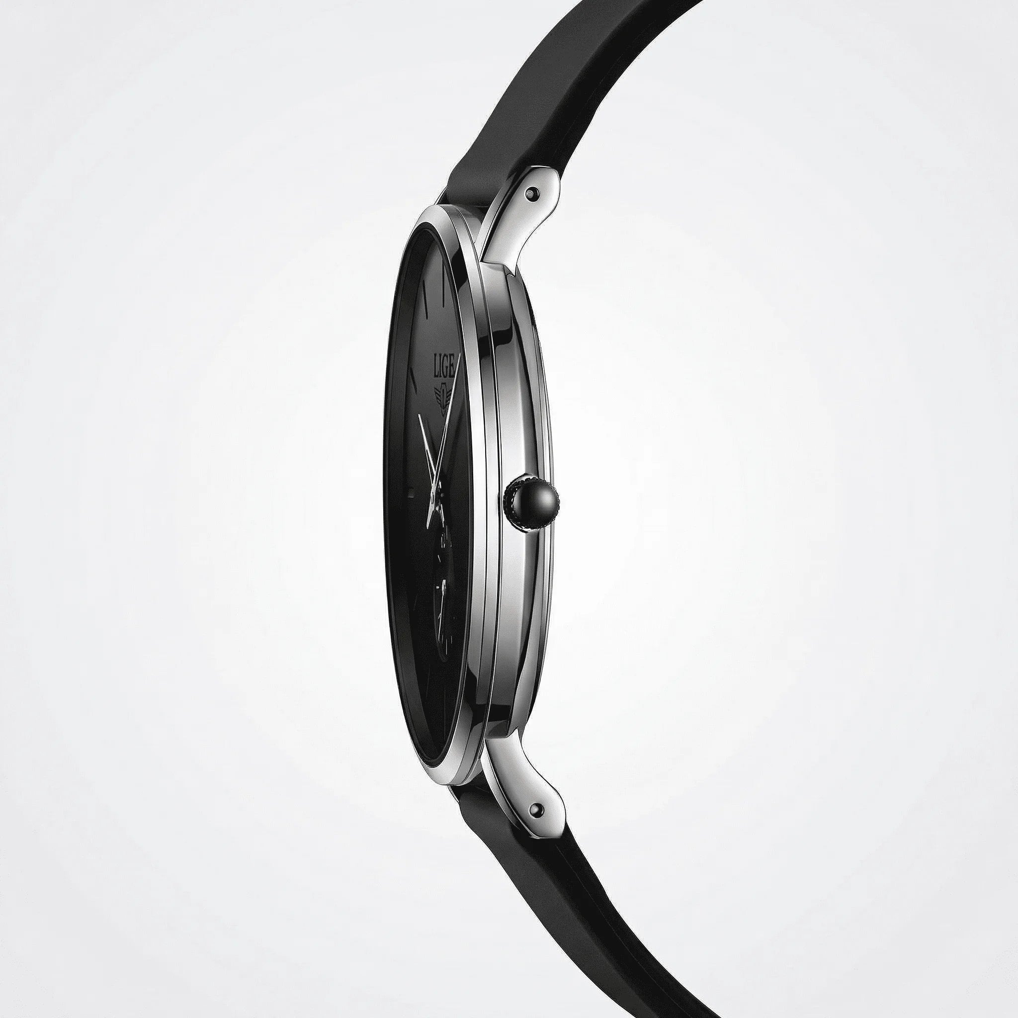 Angled presentation of a sleek black and rose gold watch, an ultra-thin watch for men.