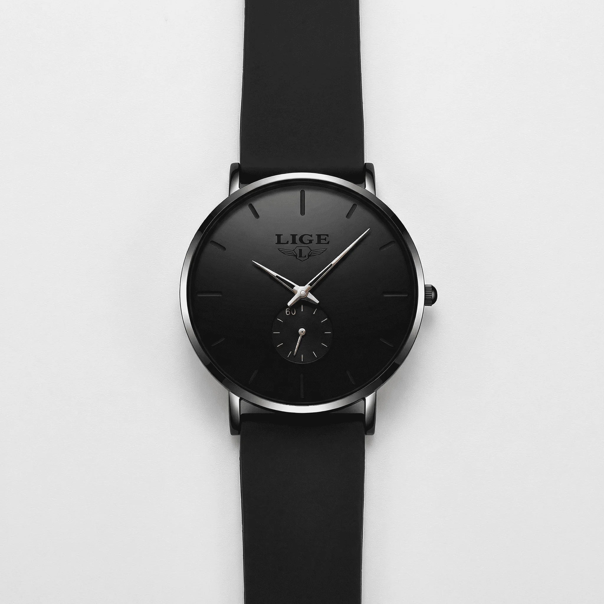 Classic straight-on view of a minimalist black and rose gold watch, a sophisticated dress watch.