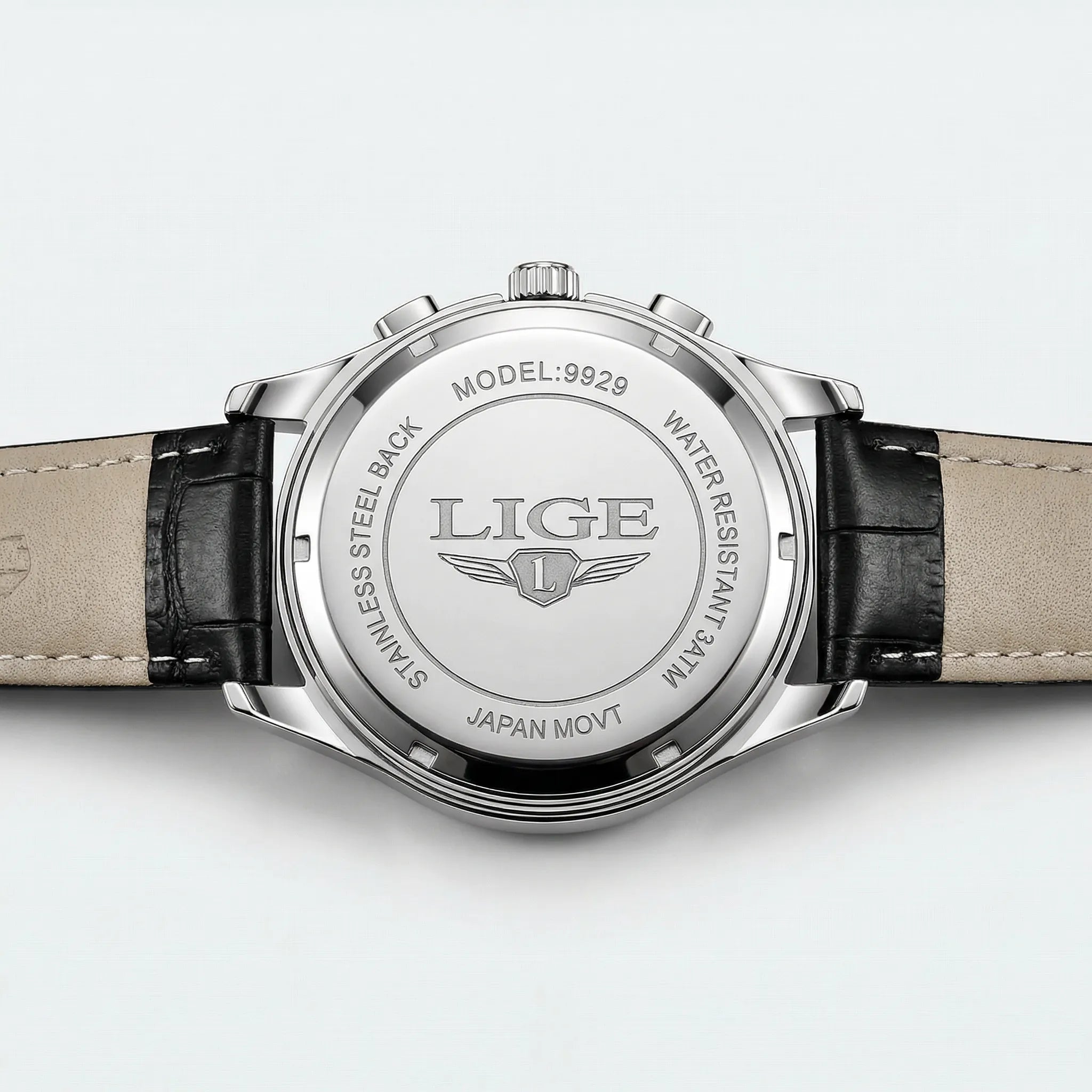 Detailed look at the leather band on a silver watch, offering comfort and style.
