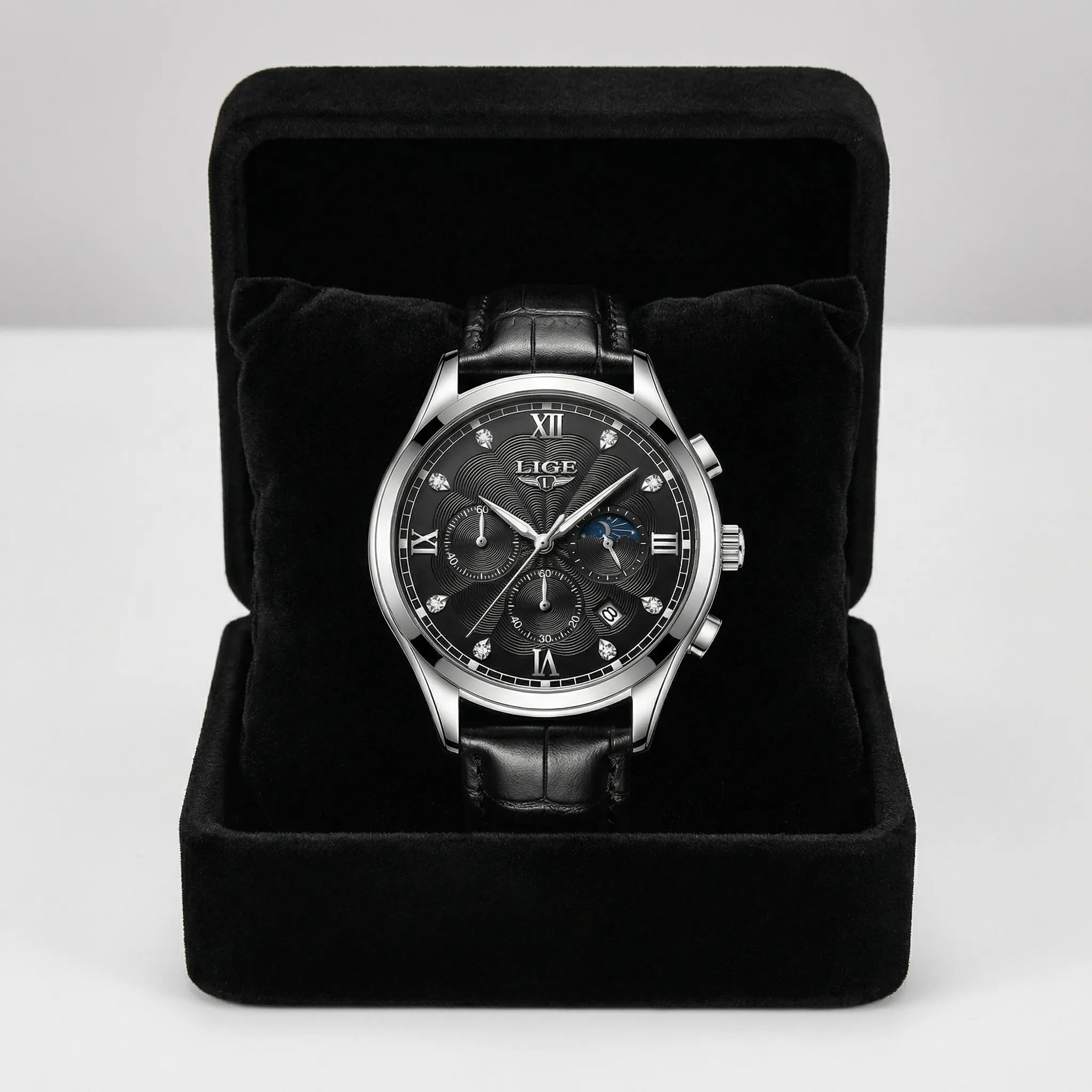 Front straight view of a silver watch with a black dial, an excellent simple watch.
