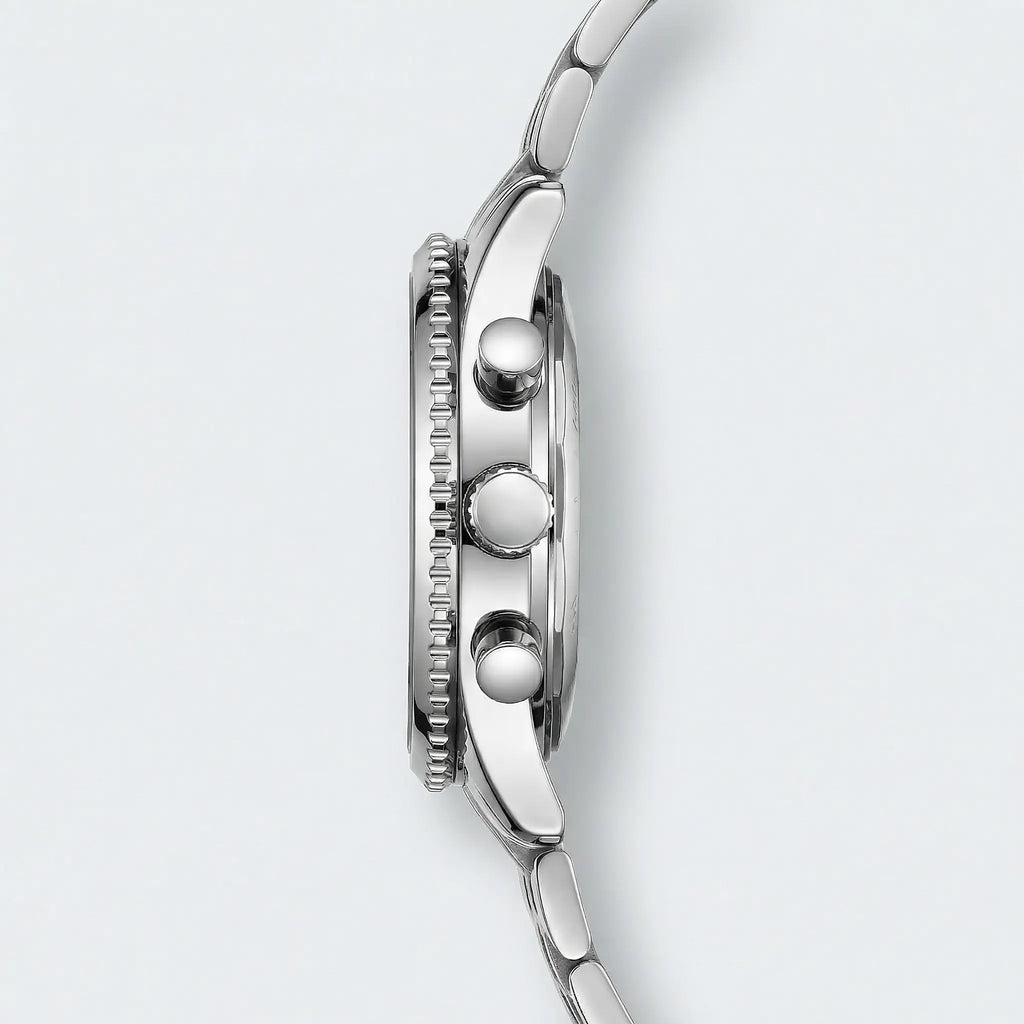 Close-up of the blue dial on a silver stainless steel watch, highlighting its precision quartz movement.