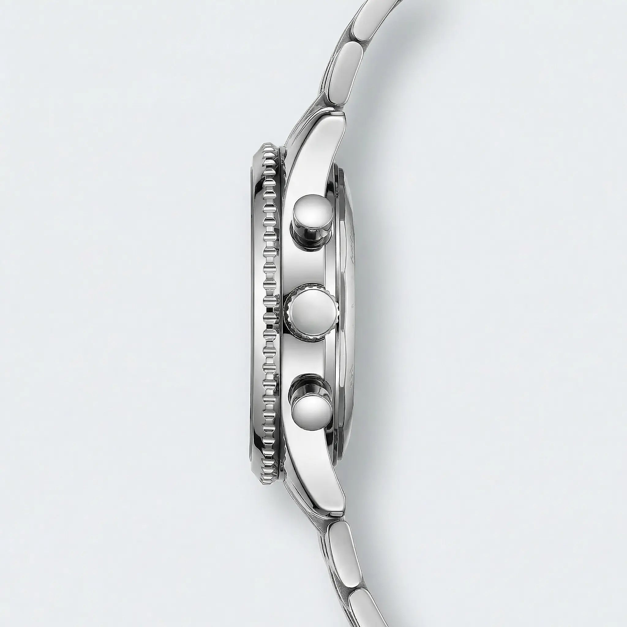 Close-up of the blue dial on a silver stainless steel watch, highlighting its precision quartz movement.