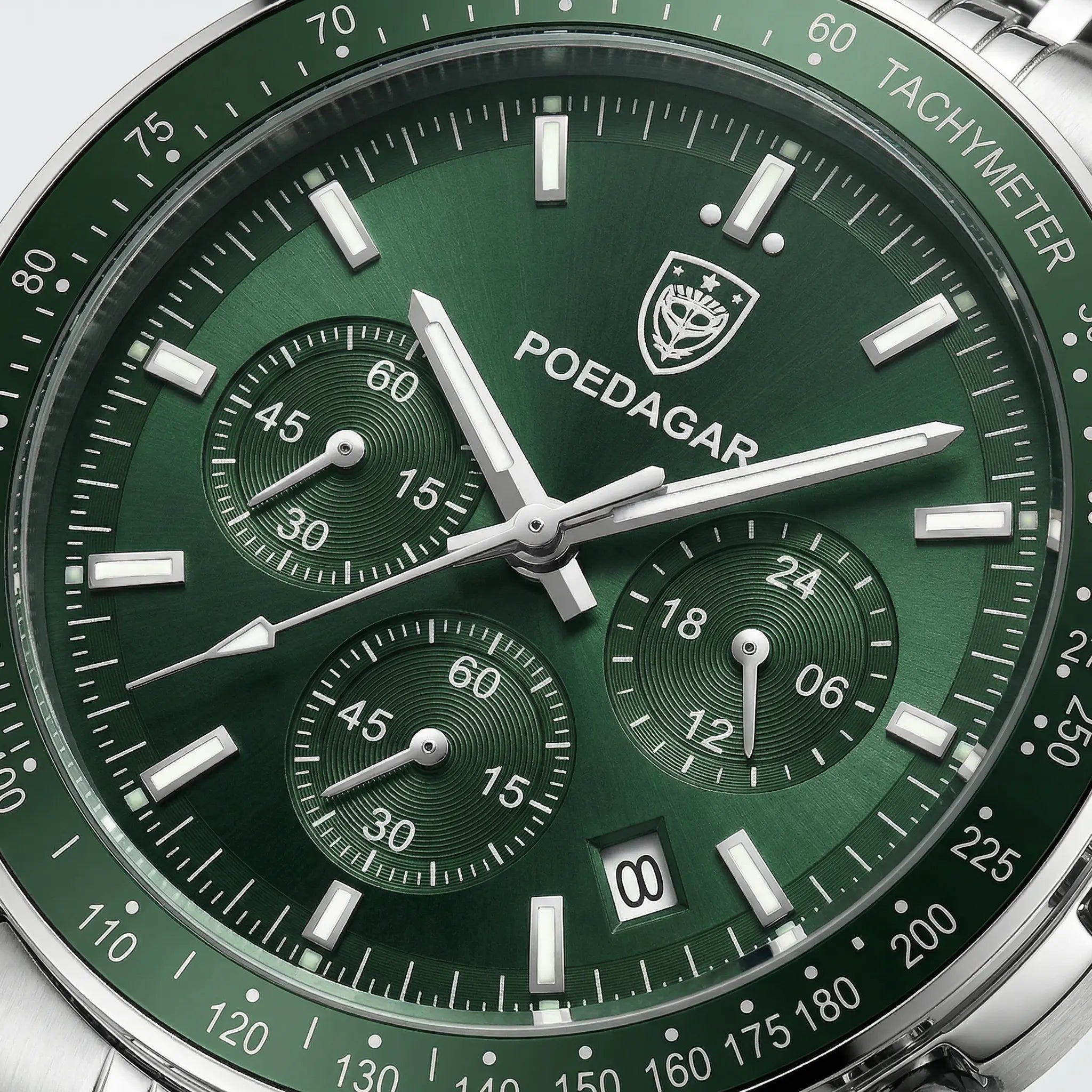 Close-up of the green dial on a premium stainless steel watch, featuring precision quartz movement.