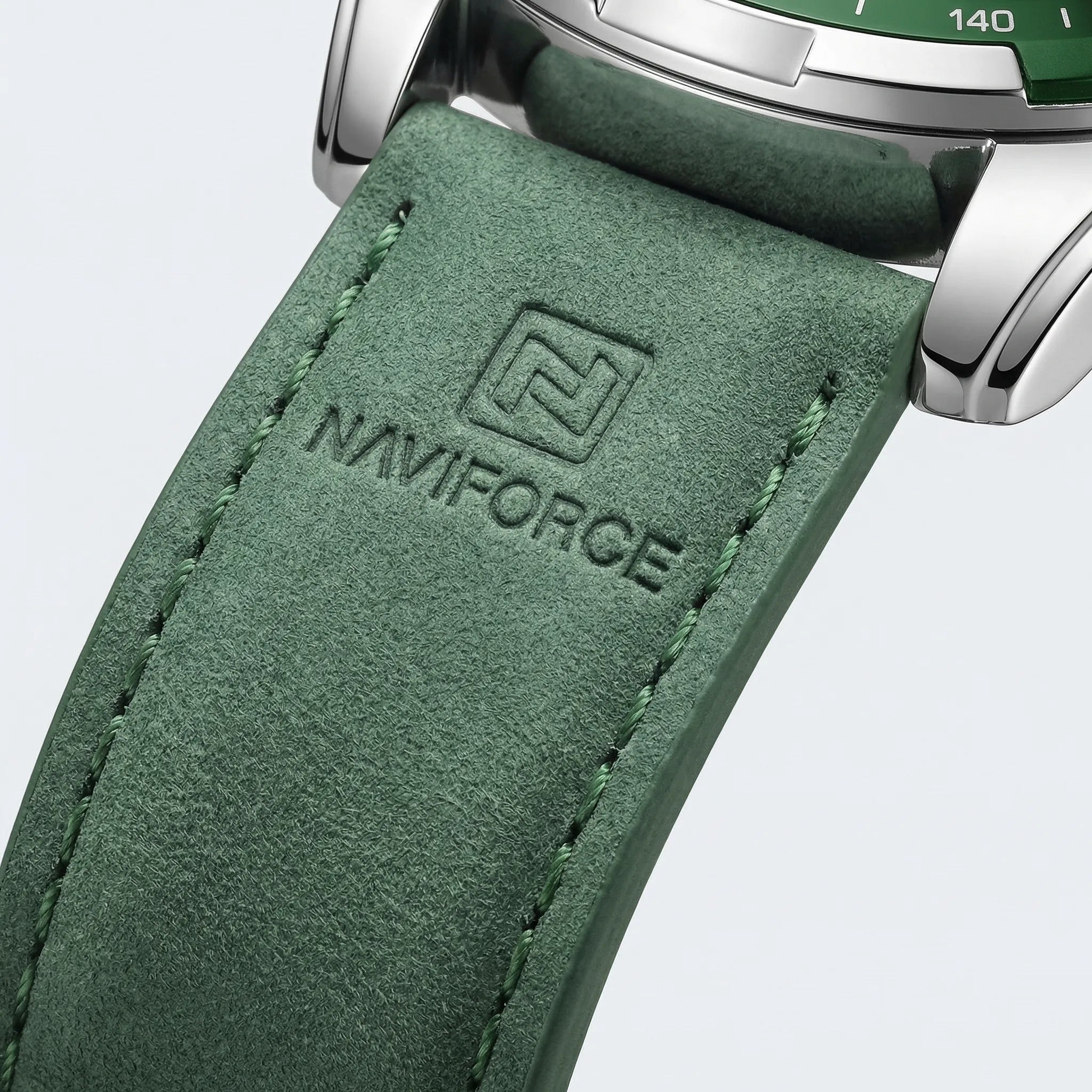 Side profile showing the thick shock-resistant case of a green sports watch, a durable waterproof watch.