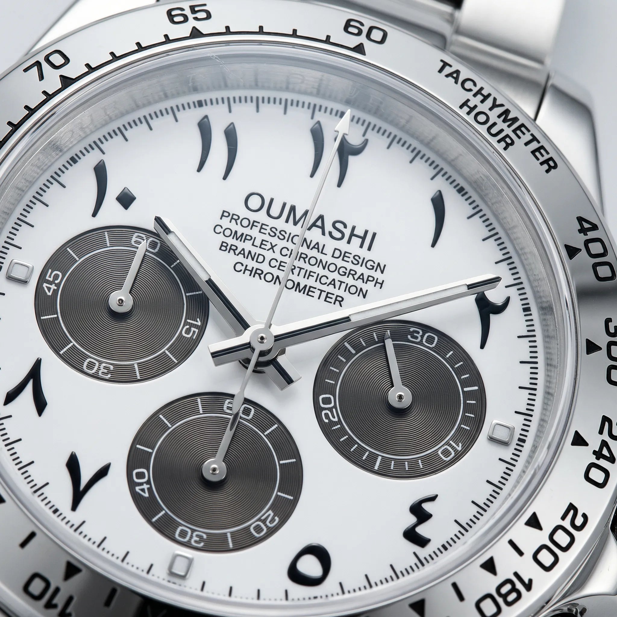 Angled presentation of a modern silver watch, a sophisticated choice among arabic dial watches.