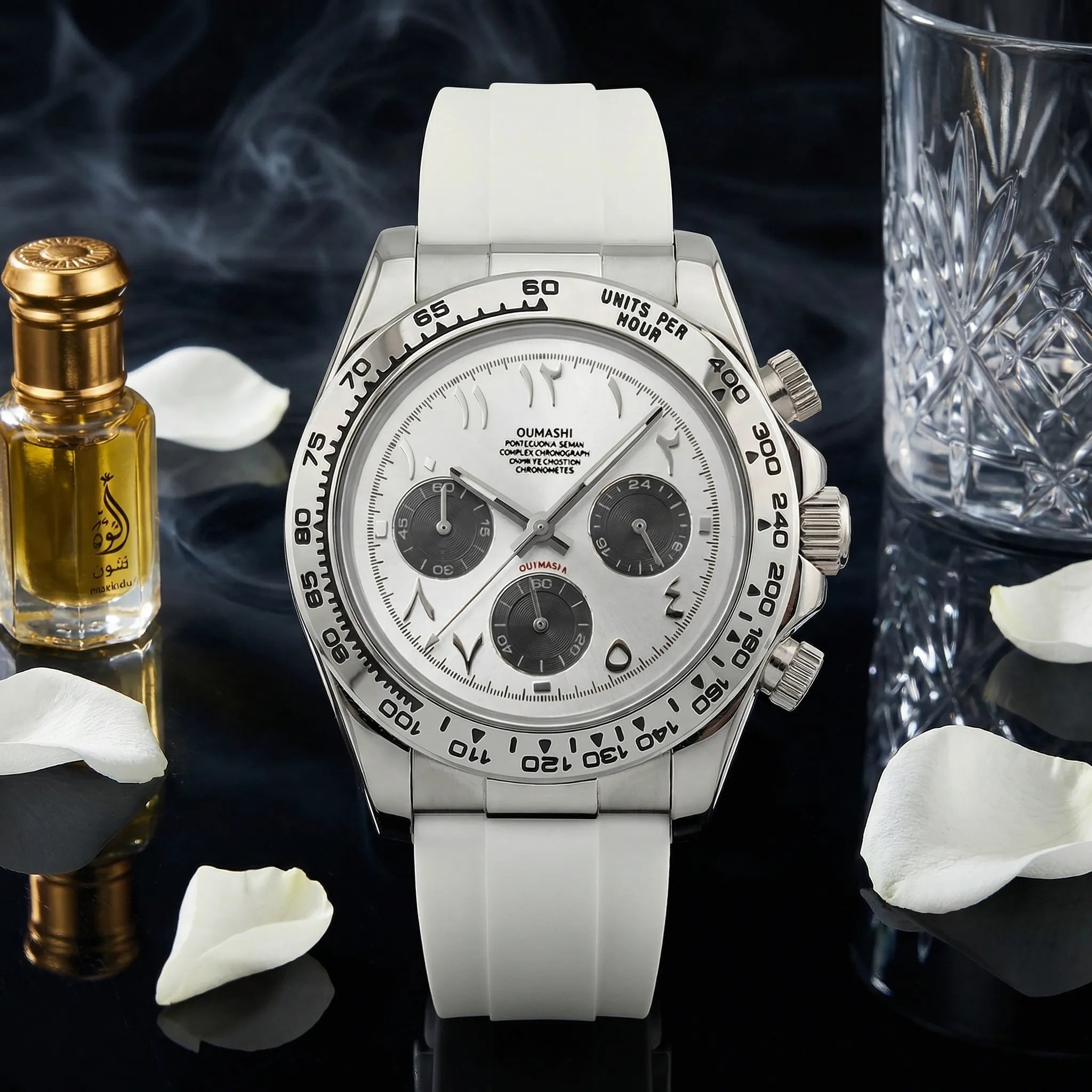 Man wearing a sleek silver watch with a white Arabic dial on his wrist, a refined wrist watch.